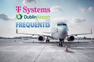 an airplane on ground; in the sky the logos of T Systems, Dublin Airport, and Frequentis are shown