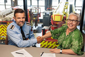 PR teaser picture, showing Gunnar Pedersen, Chairman of the Board of NKS110 IKS & Monika Haselbacher, COO Frequentis. © NKS110, Nicolas Tourrenc