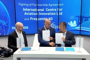 Reinhard Grimm, Norbert Haslacher and Patrick Ky shaking hands