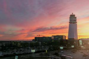 Air traffic management tower of Vienna international airport during sunset