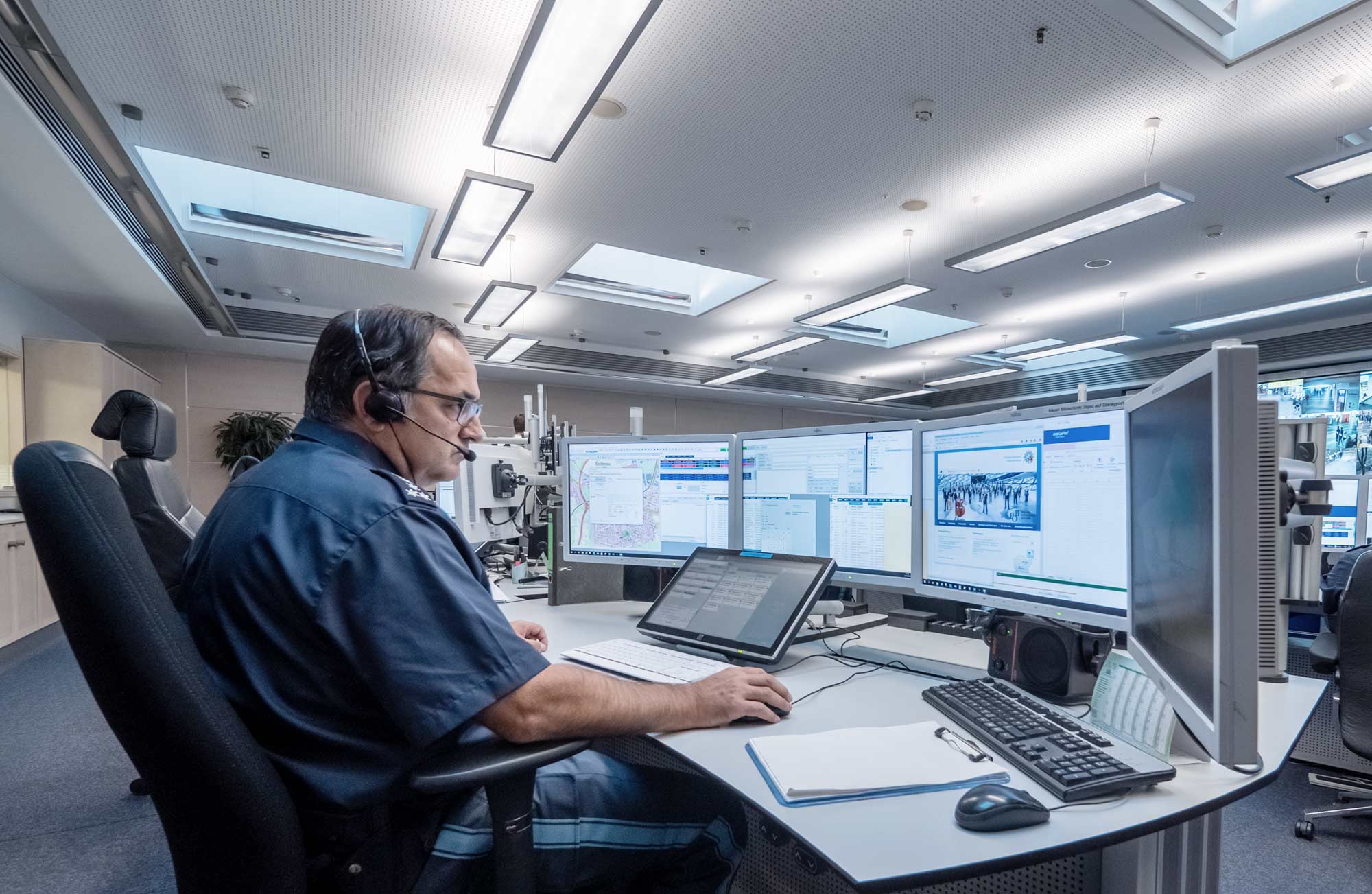 Focus areas Public Safety web header, showing a person operating in a control room