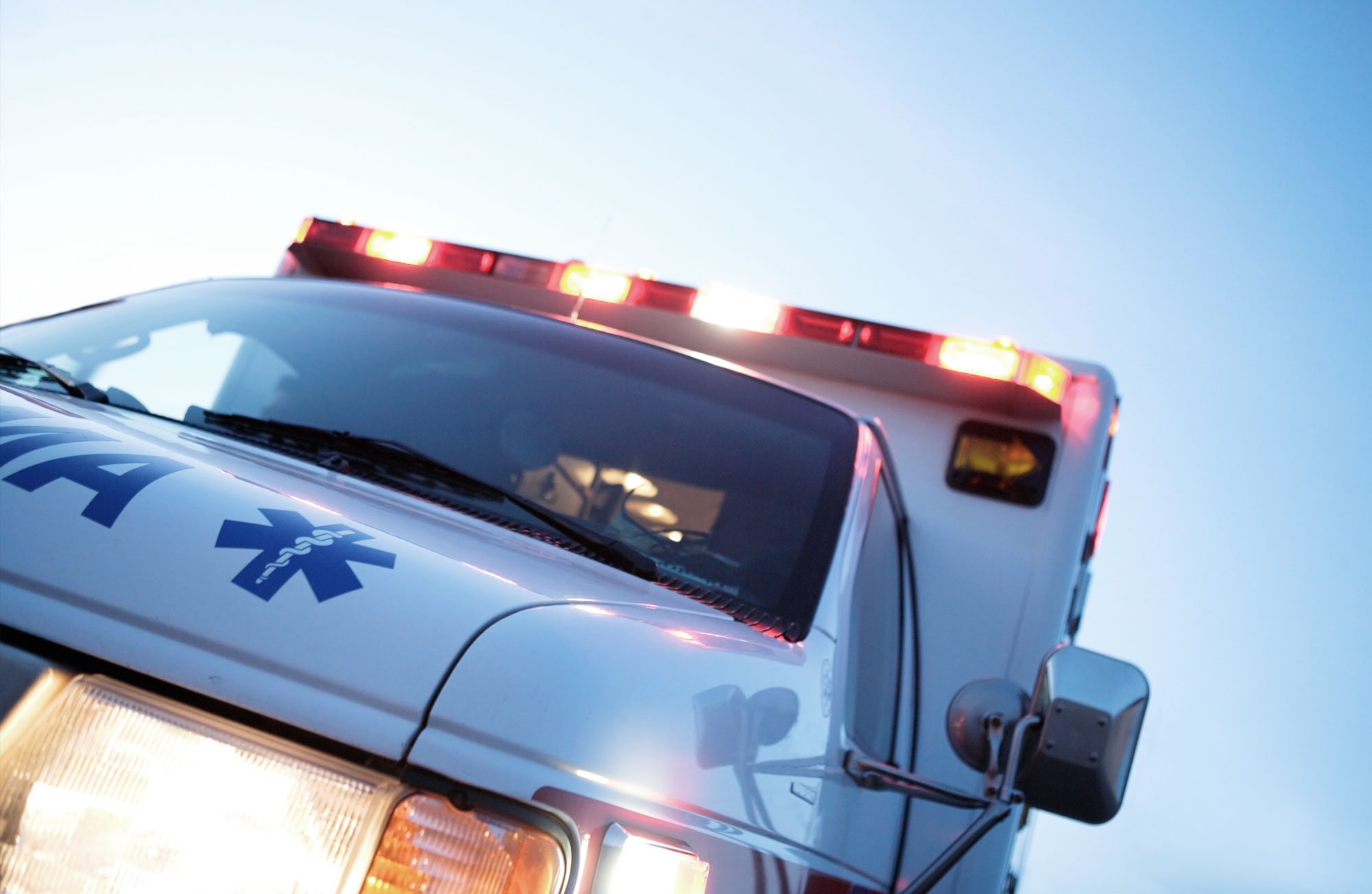 Incident Management and Dispatch website header, showing an ambulance vehicle