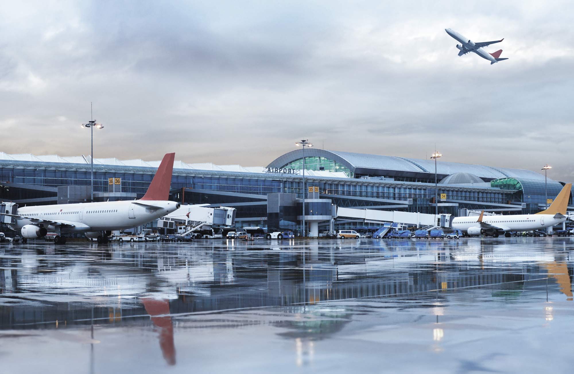 header picture showing an airport and three airplanes