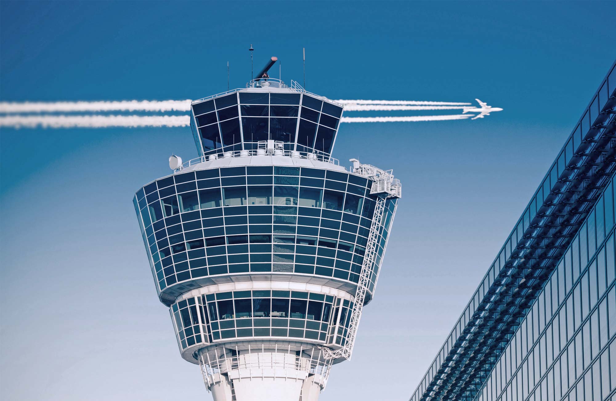 Demand capacity balancer header picture, showing a tower and an airplane