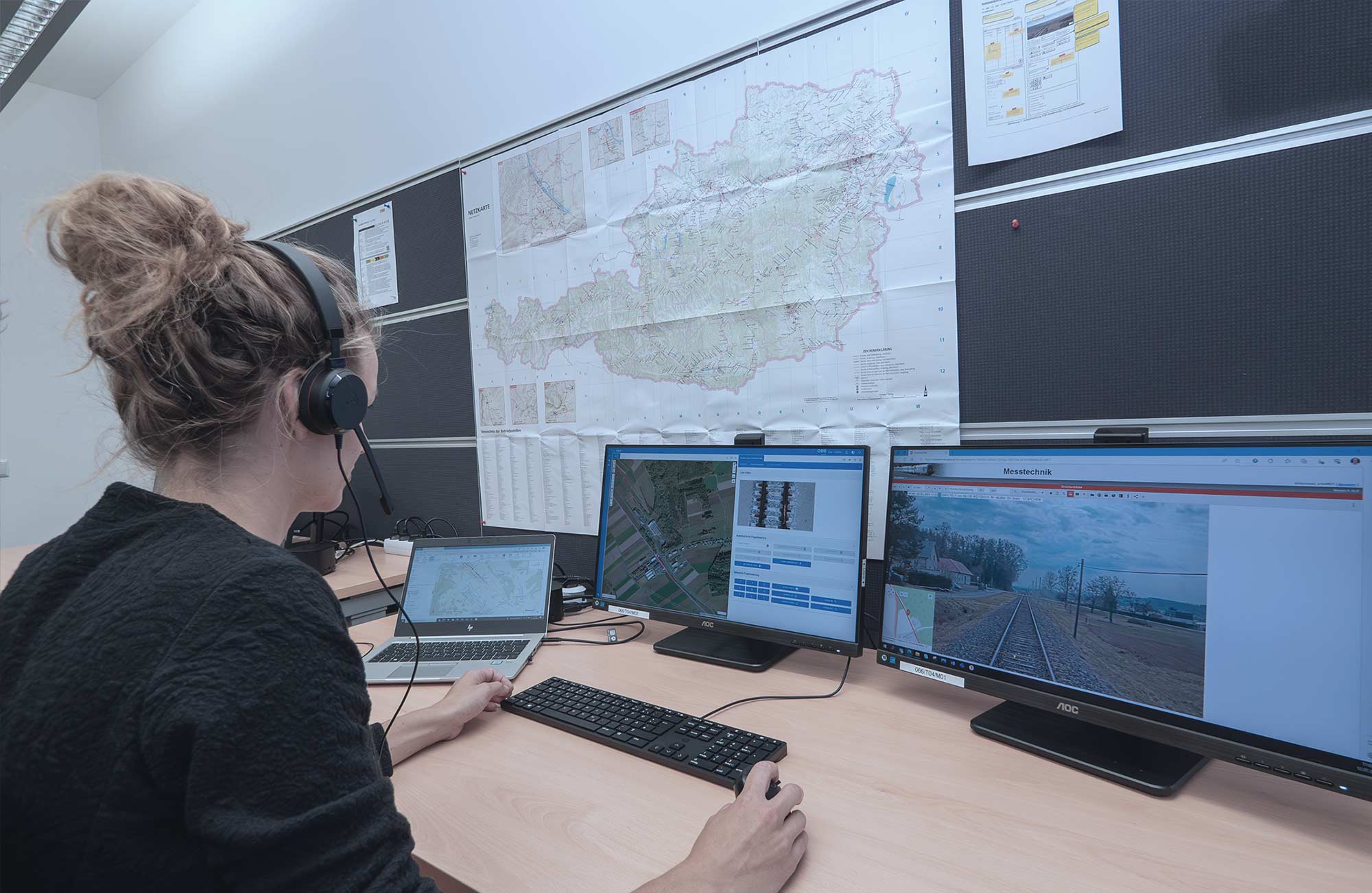 Future Rail Mobile Communication System header picture, showing a woman working in a control room