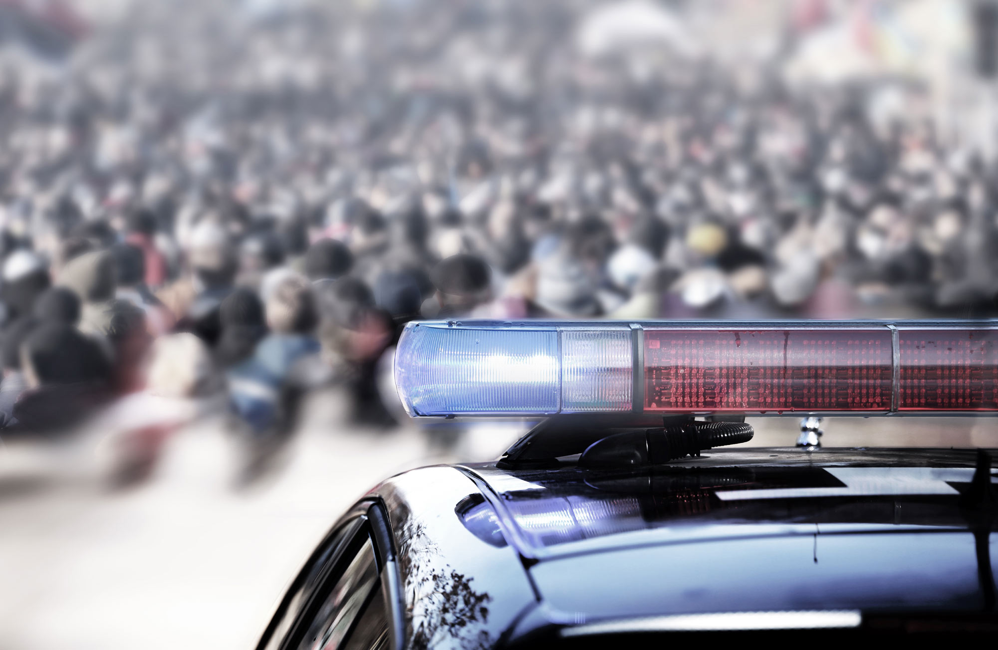 Public Safety Header Picture showing a police car and people