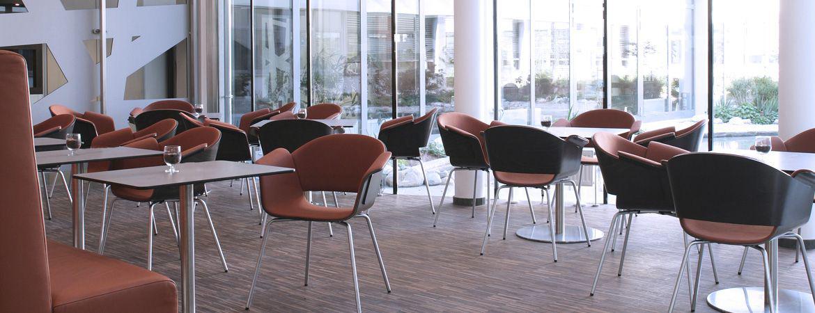 Frequentis Headquarters in Vienna, showing the coffee area and a nice view into the yard
